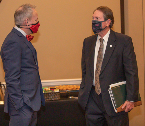 Union President Samuel W. "Dub" Oliver (left) visits with new trustee Chuck Baker prior to the Union Board of Trustees meeting Dec. 4. (Photo by Kristi Woody)