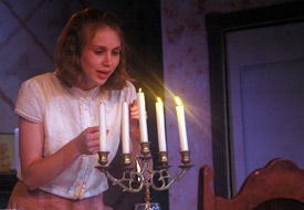 Katie Krebs rehearses a scene from "The Dining Room," which opens Oct. 10 and runs through Oct. 15. (Photo by Matthew Diggs)