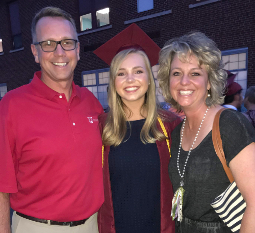 EmmaJoy Gray (center), with her dad Clay and mom Leigh, who are both Union graduates. 