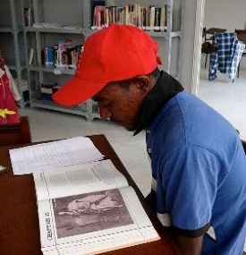 An Ethiopian man was the first patron to take advantage of the books donated by the Ryan Center to a library in Addis Ababa.
