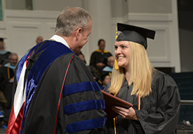 Irene Arnold, an organizational management major from Hendersonville, Tenn., was the first Union student to receive a degree from President Oliver. (Photo by Morris Abernathy)