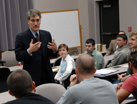 Robert George speaks to a group of students prior to his Union Forum luncheon address. (Photo by Morris Abernathy)