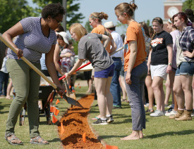Art students put the finishing touches on "Habakkuk's Wound," an art project on campus to remind viewers of persecuted Christians. (Photo by Kristi Woody)