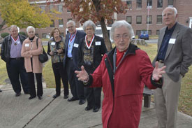 Ramona Mercer, a retired missionary and friend of Union University, gives the class of 1962 a walking tour of Union's previous campus downtown. (Photo by Morris Abernathy)