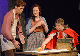 Cast members (from left) Nick Fleming, Kelsey Queen and Rebecca Leet rehearse a scene from "Into the Woods," which opens April 23. (Photo by Emily Stookey)
