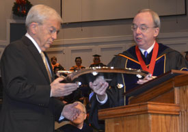Union University President David S. Dockery (right) presents the Robert E. Craig Service Award to Lloyd Hansen during the Dec. 10 commencement ceremony. (Photo by Morris Abernathy)