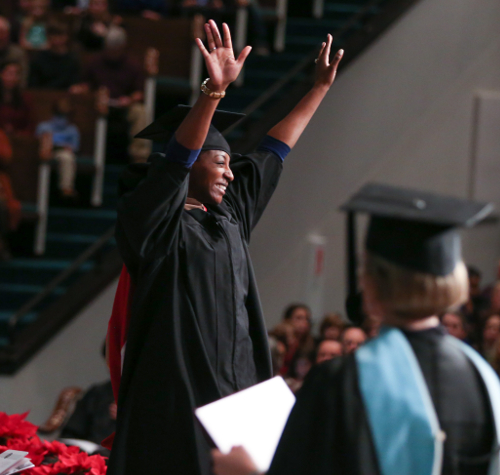 MBA graduate Desireé Blow receives her degree at commencement in December 2016. (Photo by Kristi Woody)