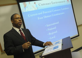 Michael Gray, a Master of Business Administration student at Union University Germantown, presents part of a strategic plan for Union's Center for Excellence in Health Care Practice. (Photo by Morris Abernathy)