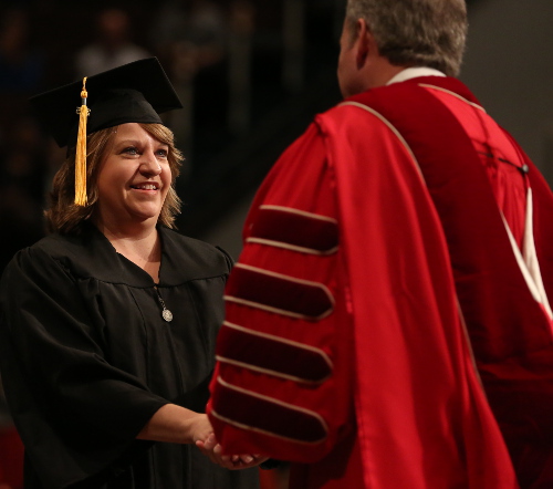 Recent BSOL student Paula McAfee receives her degree from Union President Samuel W. "Dub" Oliver. (Photo by Kristi Woody)