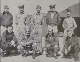 The crew of the Straight Flush. Union alumnus Gil Nicely, kneeling on the far right, was the tailgunner for the weather plane accompanying the Enola Gay.