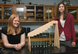 Kimberly Lukens (left) and Emilie Hoffman spent their summer doing physics research in Ohio and California. (Photo by Beth Spain)