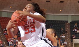 Lavanda Ross grabs a rebound in Union's 63-61 semifinal win Monday. (Photo by Morris Abernathy)