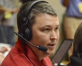 Steven Aldridge commentates during the 2011 NAIA women's national championship at Oman Arena. (Photo by Beth Spain)