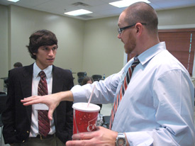 Jonathan Boyd (left), of Jackson, Tenn., one of the participants in Scholars of Excellence weekend, visits with enrollment counselor Ronnie Smith. (Photo by Matthew Diggs)