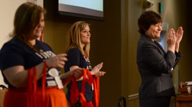 Ashley Blair (right), assistant professor of communication arts at Union and president of the 2013 Southeast Journalism Conference, applauds the winners of the Onsite Competition during the conference at Union. Also pictured are Union students Kathryn Moore (left) and McKenzie Masters. (Photo by Jacob Moore)