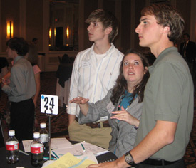 Stephen Lynch, Marielle Dirkx and Jonathan Moore discuss a stock trade as part of the Fifth Third Bank Stock Market Challenge.