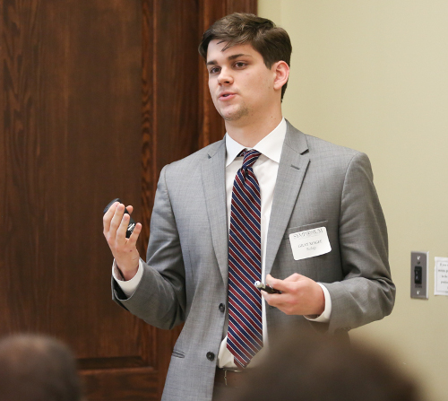 Gray Magee presents research on regenerating African mahogany trees. (Photo by Kristi Woody)