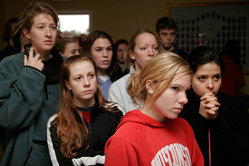 Center: Caitlin Clinger, Maggie Paredes, right, Rachel Fillinger, back center, Alania Bare, left, were among the first Union students to return to campus after Tuesday night's tornado. With students hoping to attempt to reclaim belongings and vehicles, authorities have closed down the campus to assess the damage. Photo by Kyle Kurlick