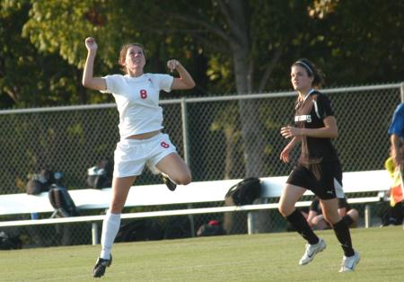Roxanna Skelton jumps for a header as she attempts to send the ball down the field. - Photo by Tommy Sadler