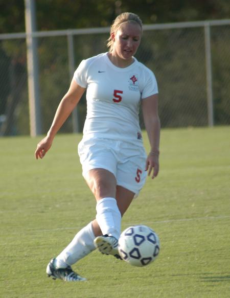Alicia Bennett kicks the ball down field. - Photo by Tommy Sadler