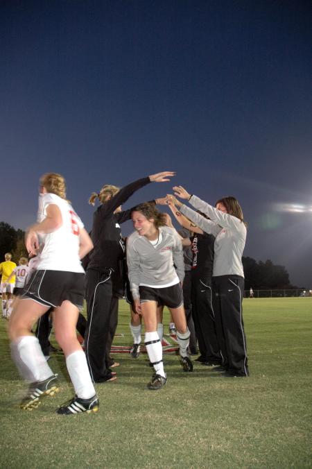 Union's Lady Bulldog soccer team celebrates with fans and junior varsity players after their 2-0 win over Lambuth. - Photo by Beth Spain