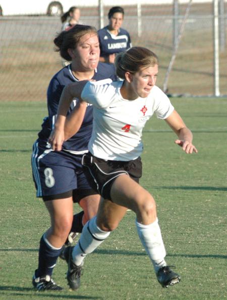 Emily Rawls breaks free from a defender as she moves to the ball. - Photo by Tommy Sadler