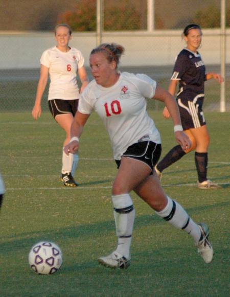 Cheslie Tharpe moves the ball up the field as she starts a Union attack. - Photo by Tommy Sadler