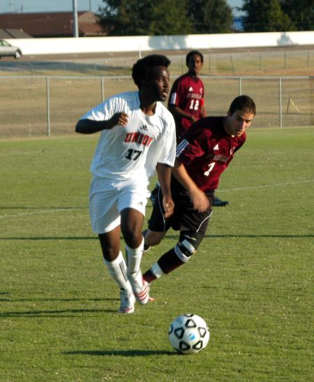 Rabo Garbo looks ahead for his next move as he takes the ball up the field in Union's match versus Cumberland. - Photo by Steven Aldridge