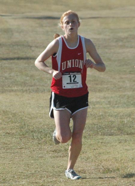 Carissa Wilson races during the Union University Cross Country Invitational. - Photo by Tommy Sadler