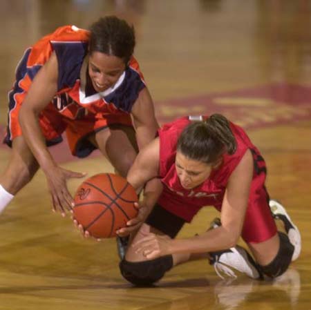 Langston's #42 Patrice Sims and Unions #11 Jennifer Henson fight for the ball in the first round of the NAIA championship. Stephan Frazier/The Jackson Sun - Photo by Stephan Frazier