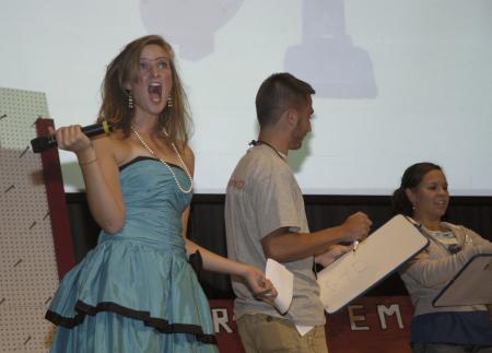 Sophomore Bonnie Smith reacts to a contestant's response at the SAC Game Show during Focus. - Photo by Sarah Palmer Goff