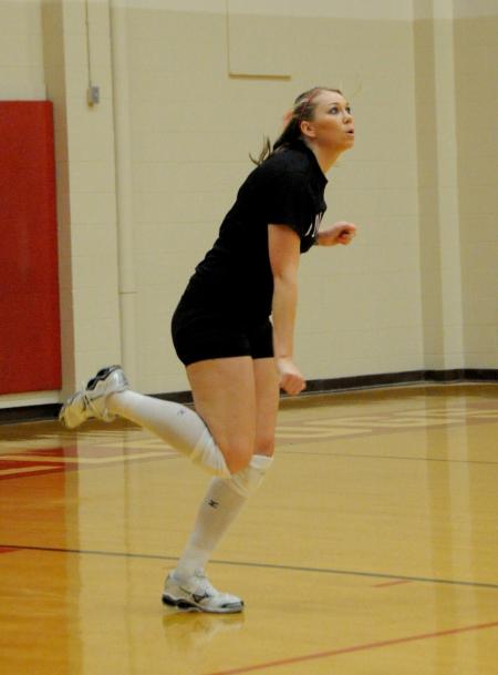 CJ Neathamer serves the ball during a match versus Rhodes (Tenn.) College. - Photo by Morris Abernathy
