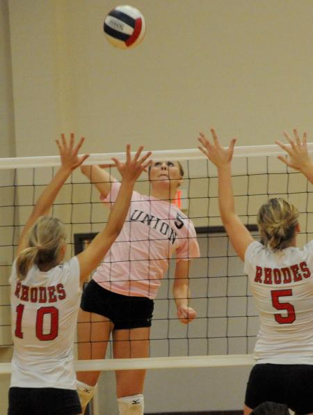 Ashley Young hits the ball in a match versus Rhodes (Tenn.) College. - Photo by Morris Abernathy