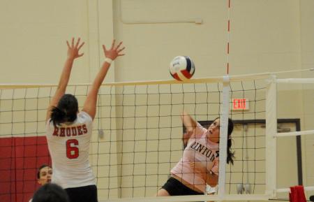 Lindsey Wilson hits the ball over the net during a match versus Rhodes (Tenn.) College. - Photo by Morris Abernathy