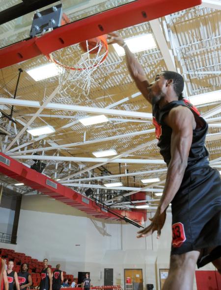 Freshman Samuel Danache lays the ball in the net during Bulldog Madness. - Photo by Morris Abernathy