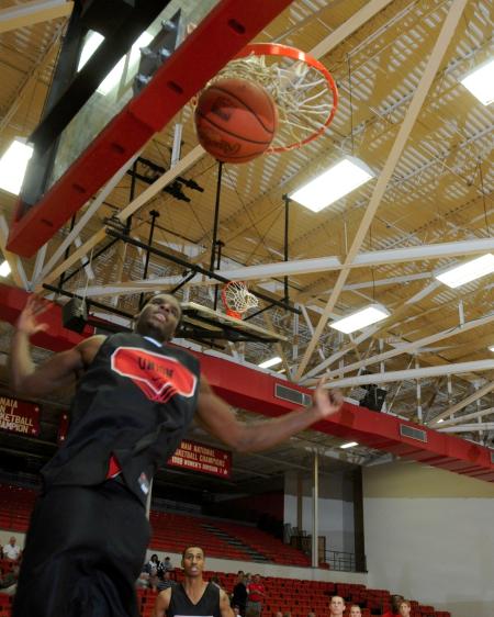Antoine Joseph wows the crowd with a dunk during Bulldog Madness. - Photo by Morris Abernathy