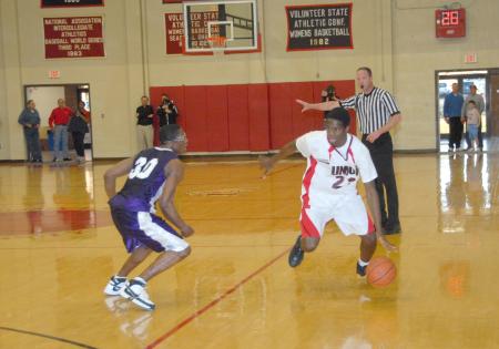 Union freshman Antoine Joseph drives past a defender from Bethel (Tenn.) College. - Photo by Morris Abernathy