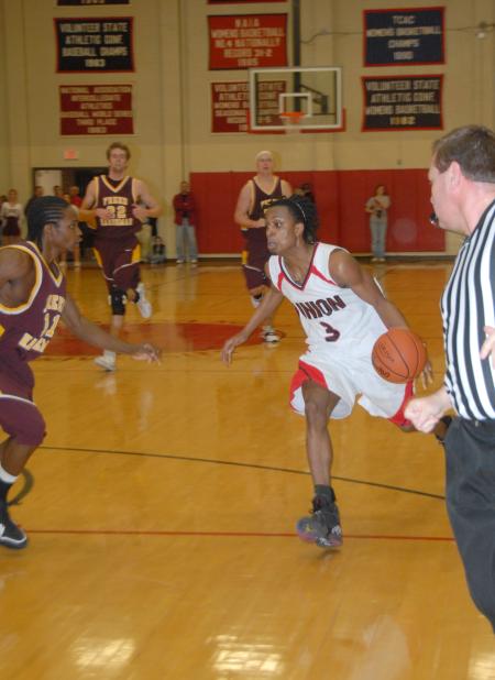 Sophomore Tacuma Alexander drives to the basket in a game versus conference foe Freed-Hardeman (Tenn.) University. - Photo by Morris Abernathy