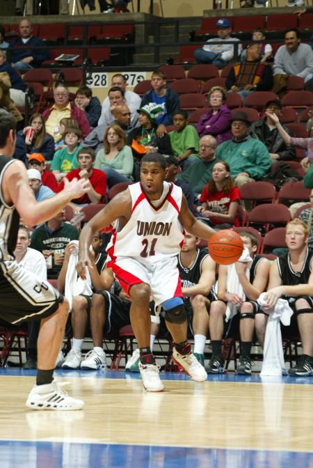 Brian Lake, sophomore, drives to the basket in a game versus Concordia (Calif.) University during the 2007 NAIA National Tournament held at Municipal Auditorium in Kansas City, Missouri. - Photo by Uncredited