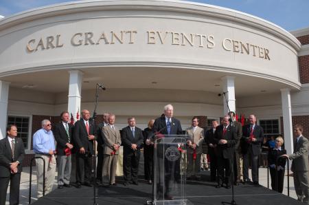 Carl Grant speaks after the ribbon cutting at the dedication of the Carl Grant Events Center. - Photo by Morris Abernathy