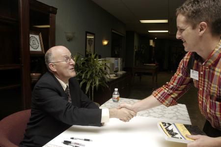 Leland Leryla greets Jeremy Black after the Carls-Schwerdfeger Lecture. - Photo by Beth Spain