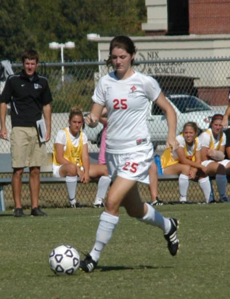 Defender Kelly Bogdanovich advances up the field with the ball. - Photo by Steven Aldridge