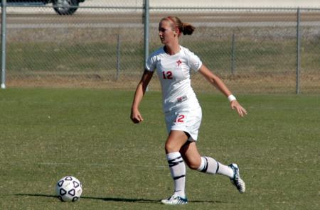 Sophomore defender Korie Elrod heads up the field with the ball. - Photo by Steven Aldridge
