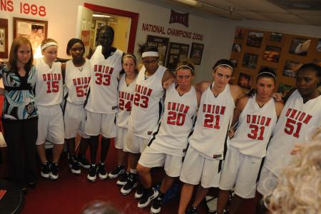 The Lady Bulldogs huddle during the post-game meeting after their Homecoming win over St. Catharine (Ky.) College. - Photo by Morris Abernathy