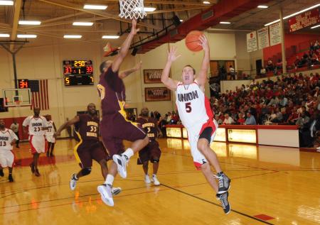 Alan North (5) makes a lay up in Union's homecoming win over Robert Morris (Ill.) College. - Photo by Morris Abernathy