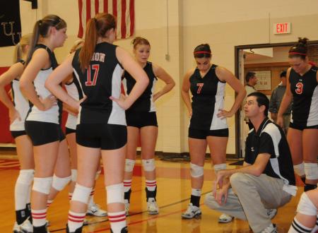Union Head Coach Steven Gream talks with his team during a timeout. - Photo by Morris Abernathy