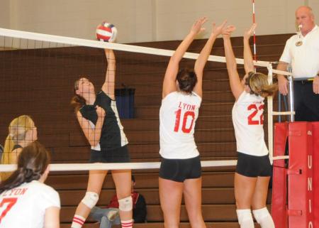 Emilie Ogas helps Union advance in the winner's bracket championship game over Lyon. - Photo by Morris Abernathy