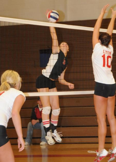 Ashley Young goes up for a kill attempt in Union's conference tournament over Lyon. - Photo by Morris Abernathy
