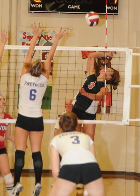 Heather Lieberman attacks the ball over Trevecca blockers during the championship match of the TranSouth Conference Tournament. - Photo by Morris Abernathy