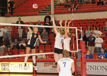 Amanda Hutchison Coyle goes up for a kill in Union's TranSouth Tournament title win. - Photo by Morris Abernathy